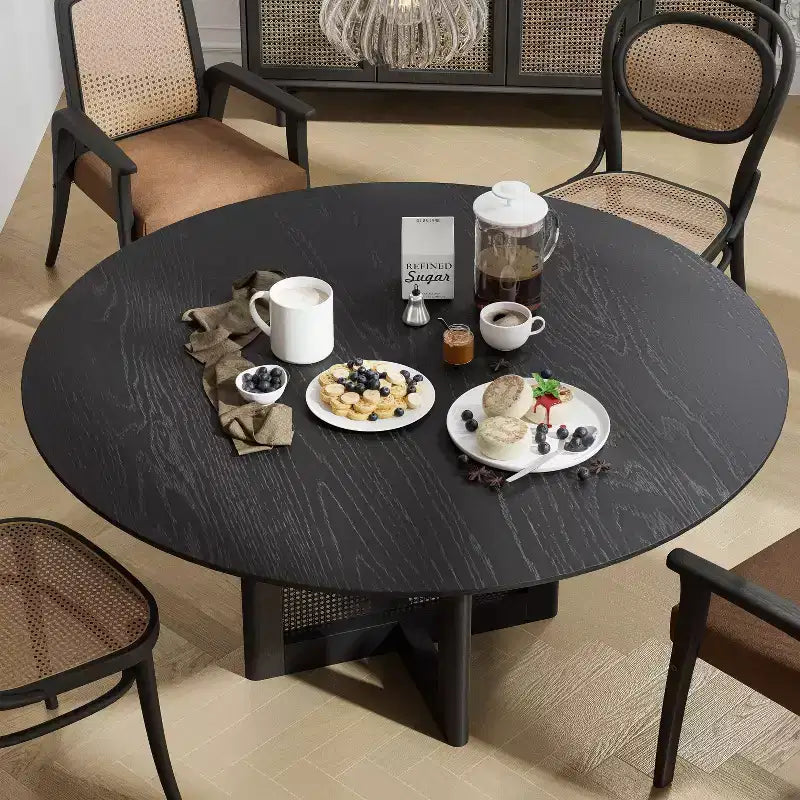 Tavolo da pranzo rotondo nero con gambe in rattan, 8 posti a sedere